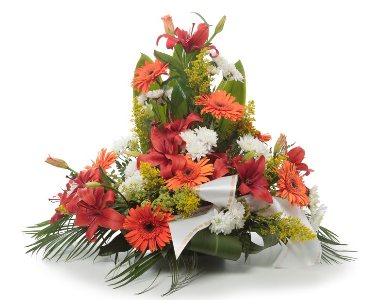 Funeral arrangement of roses lilies and gerberas